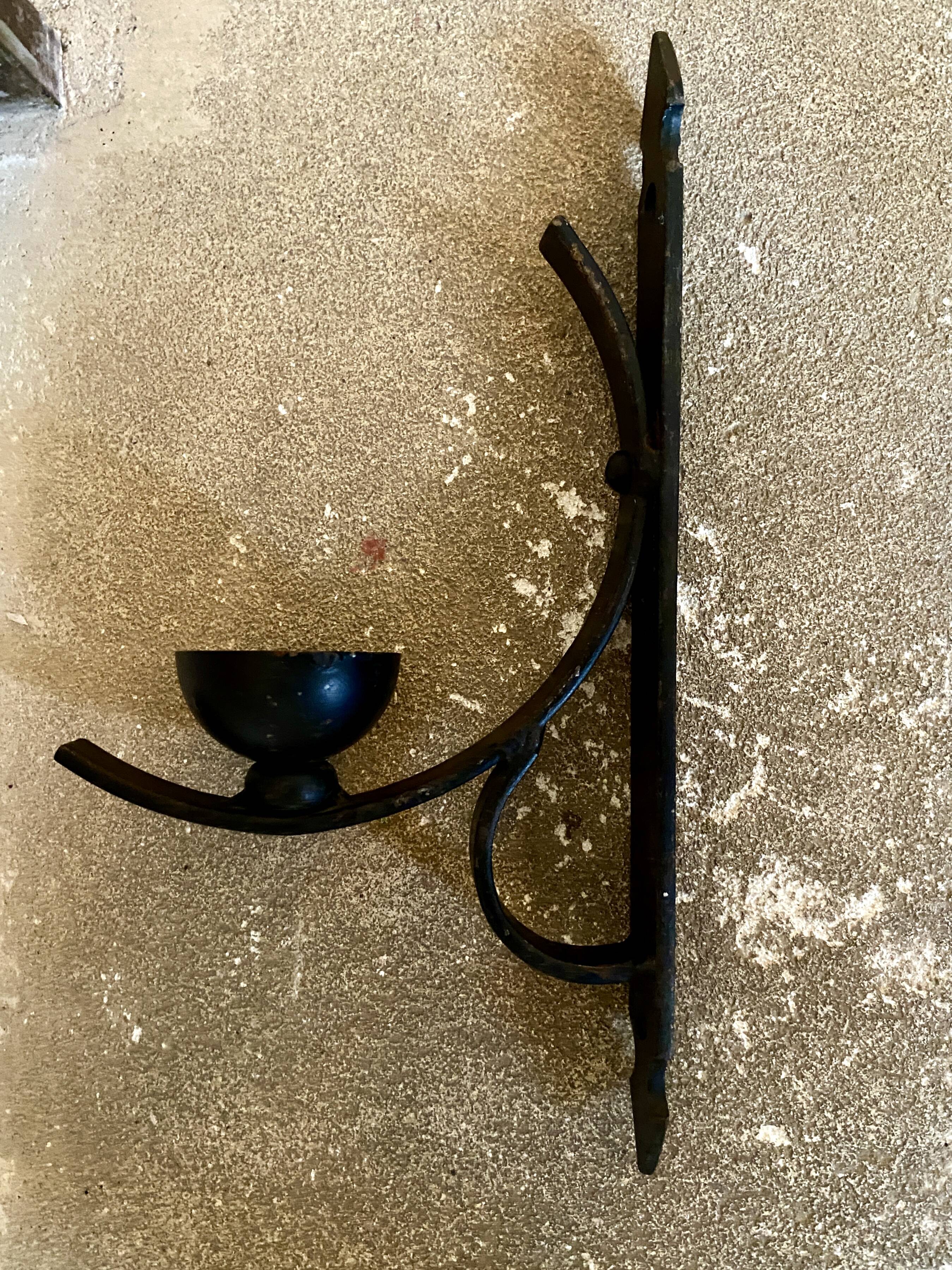 Wrought iron wall light, fabric cable