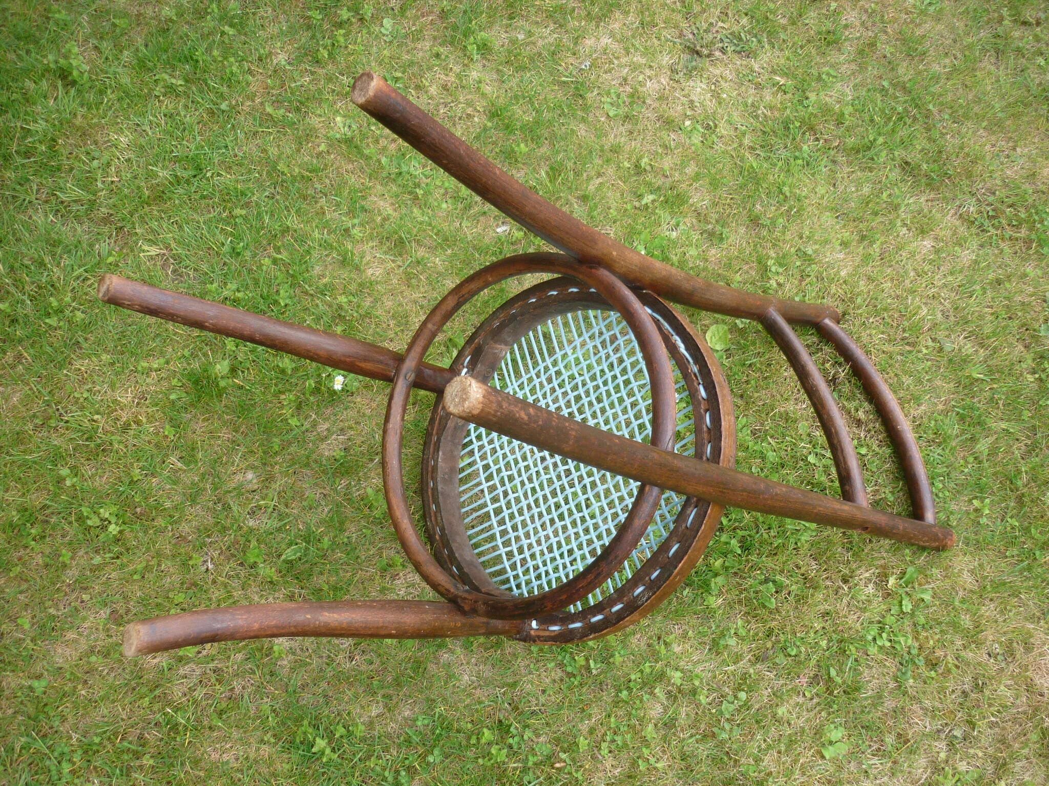 Chair with blue wire braided seat