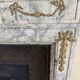 Louis XVI fireplace in veined grey marble with original gilded bronzes from the 19th century.