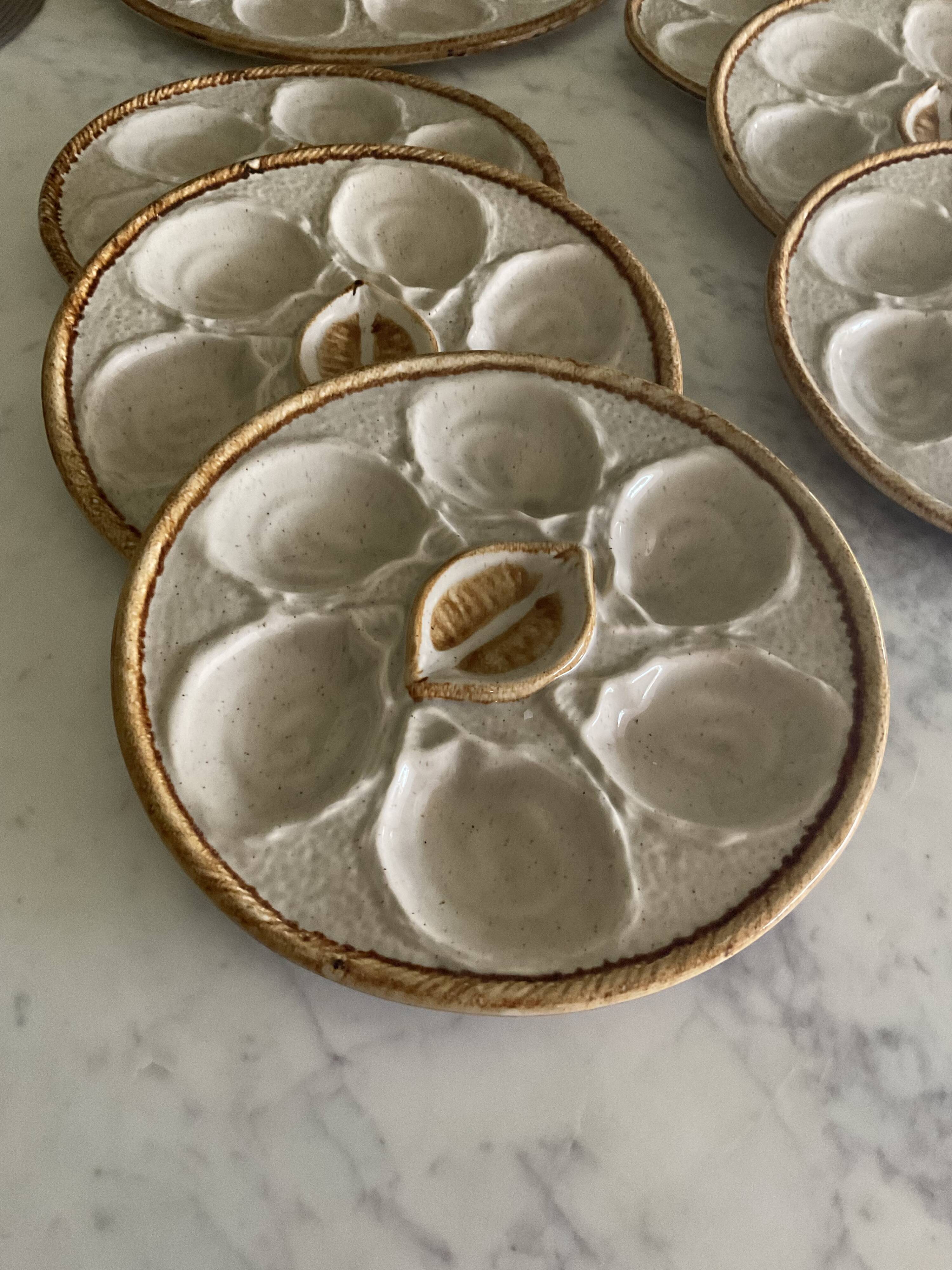 Set of 6 plates and 1 large oyster dish. Saint Clément.