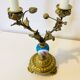 19th century candle holders in gilded bronze and porcelain