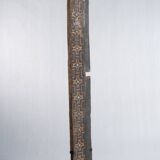 Indonesian construction element in carved wood with cross pattern in red, white geometric frieze