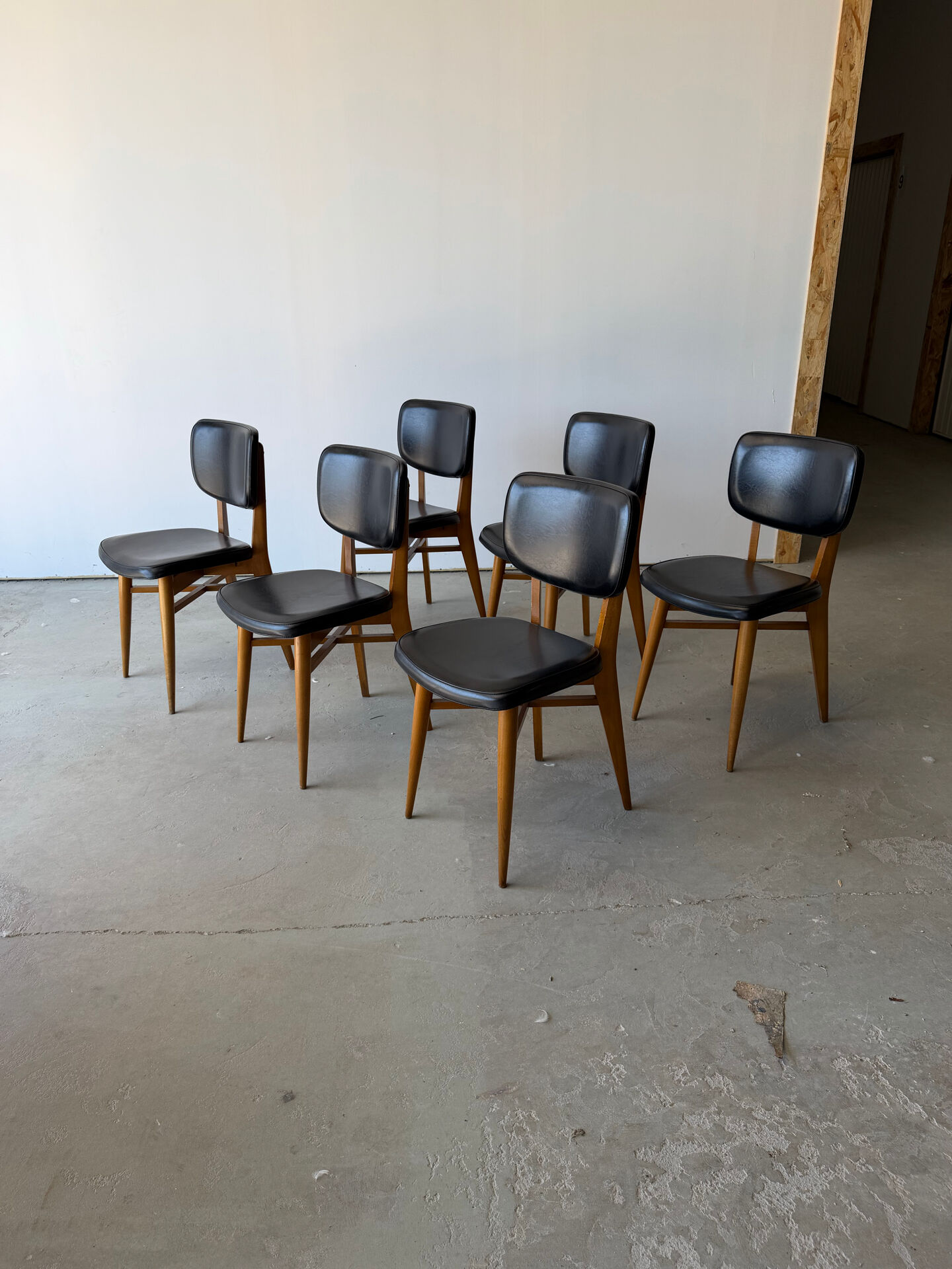 Set of 6 Scandinavian design chairs in solid beech and black Skai.