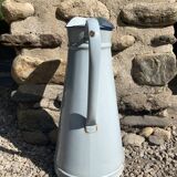 Broc in enamelled blue sheet metal