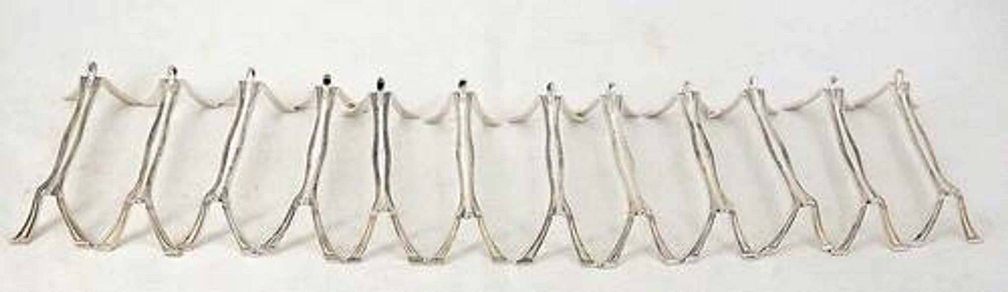 Christofle Printania model, Art Nouveau, 12 silver-plated knife rests.