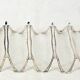 Christofle Printania model, Art Nouveau, 12 silver-plated knife rests.