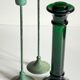 Green glass and metal candle holders