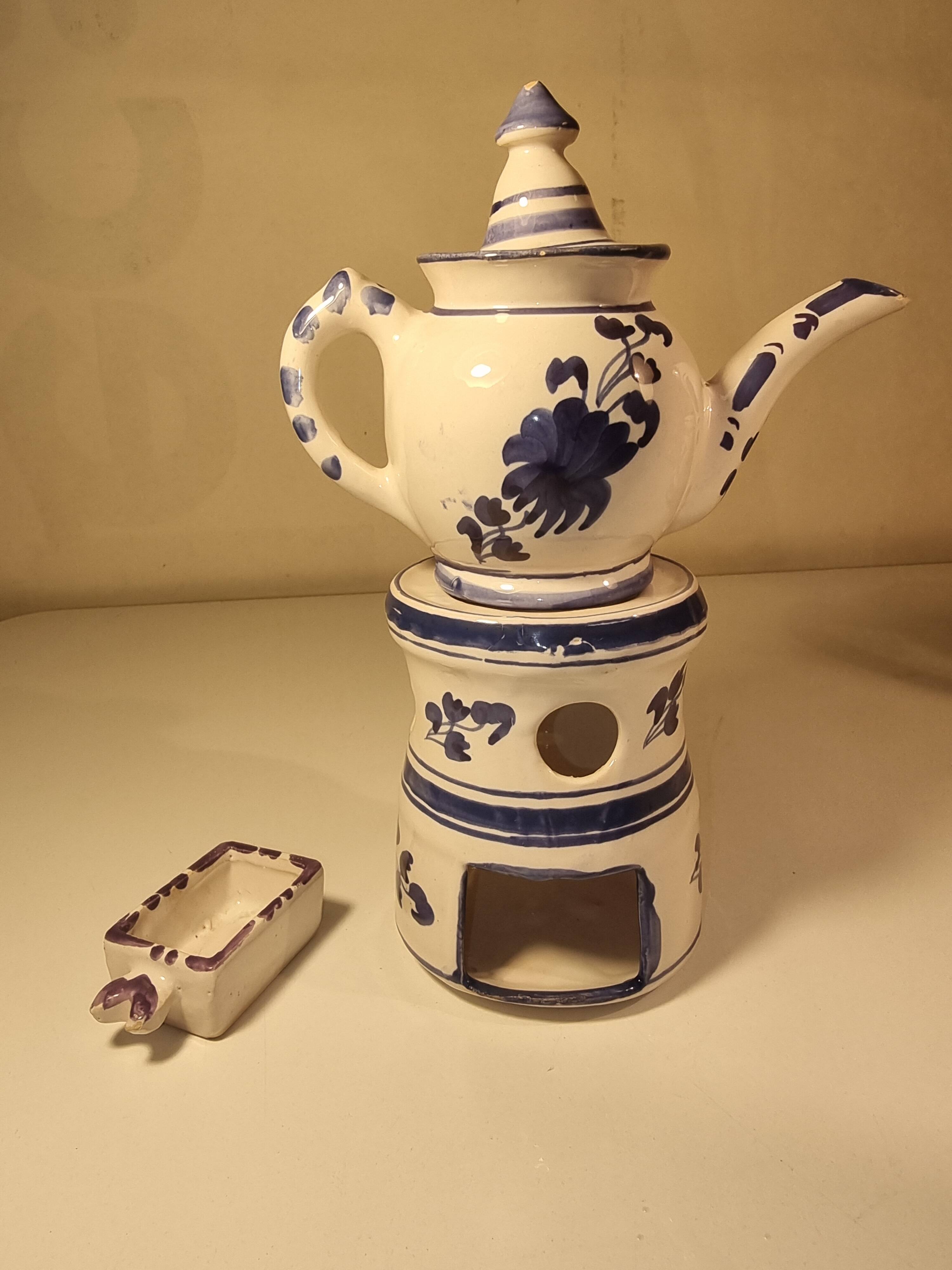Vintage teapot in earthenware