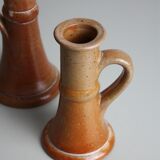 Trio of stoneware candle holders