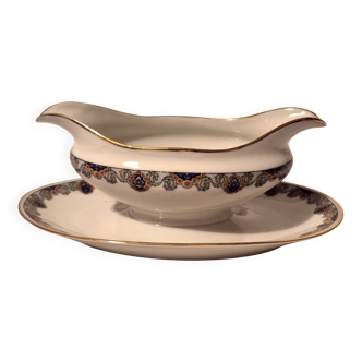 Sauceboat on a base Art Deco porcelain from Châteauroux by Gaston Sailly.