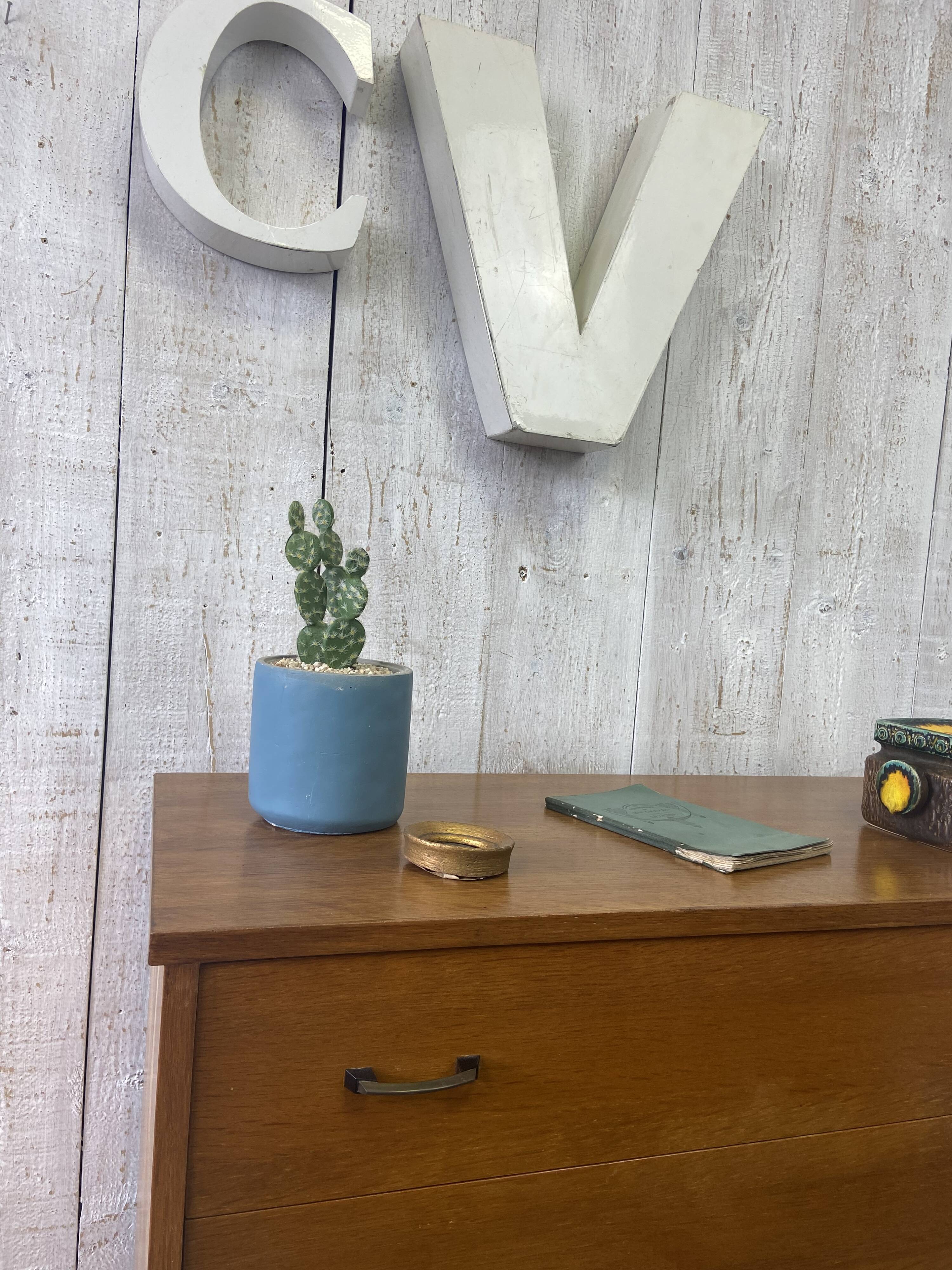 Vintage chest of drawers with conical legs