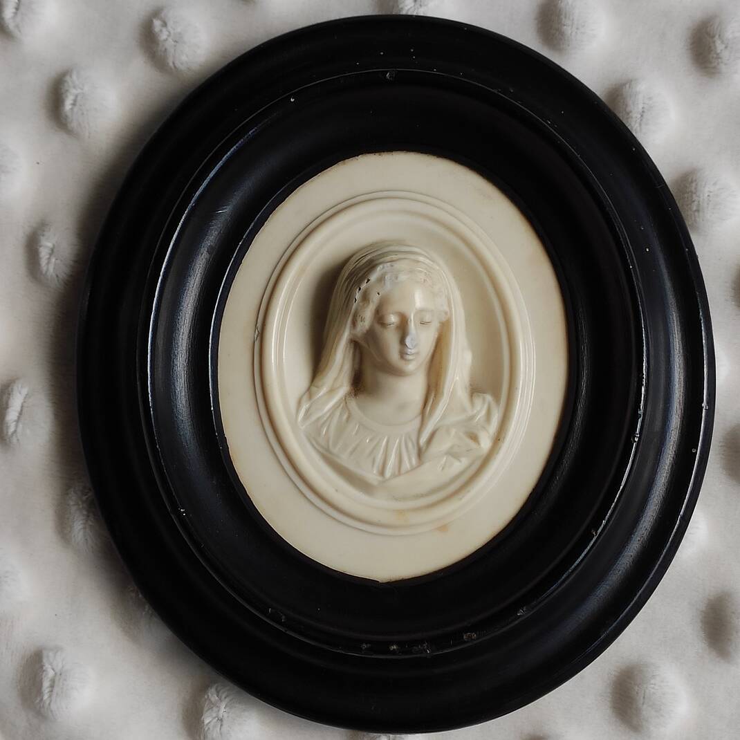 Limestone virgin medallion