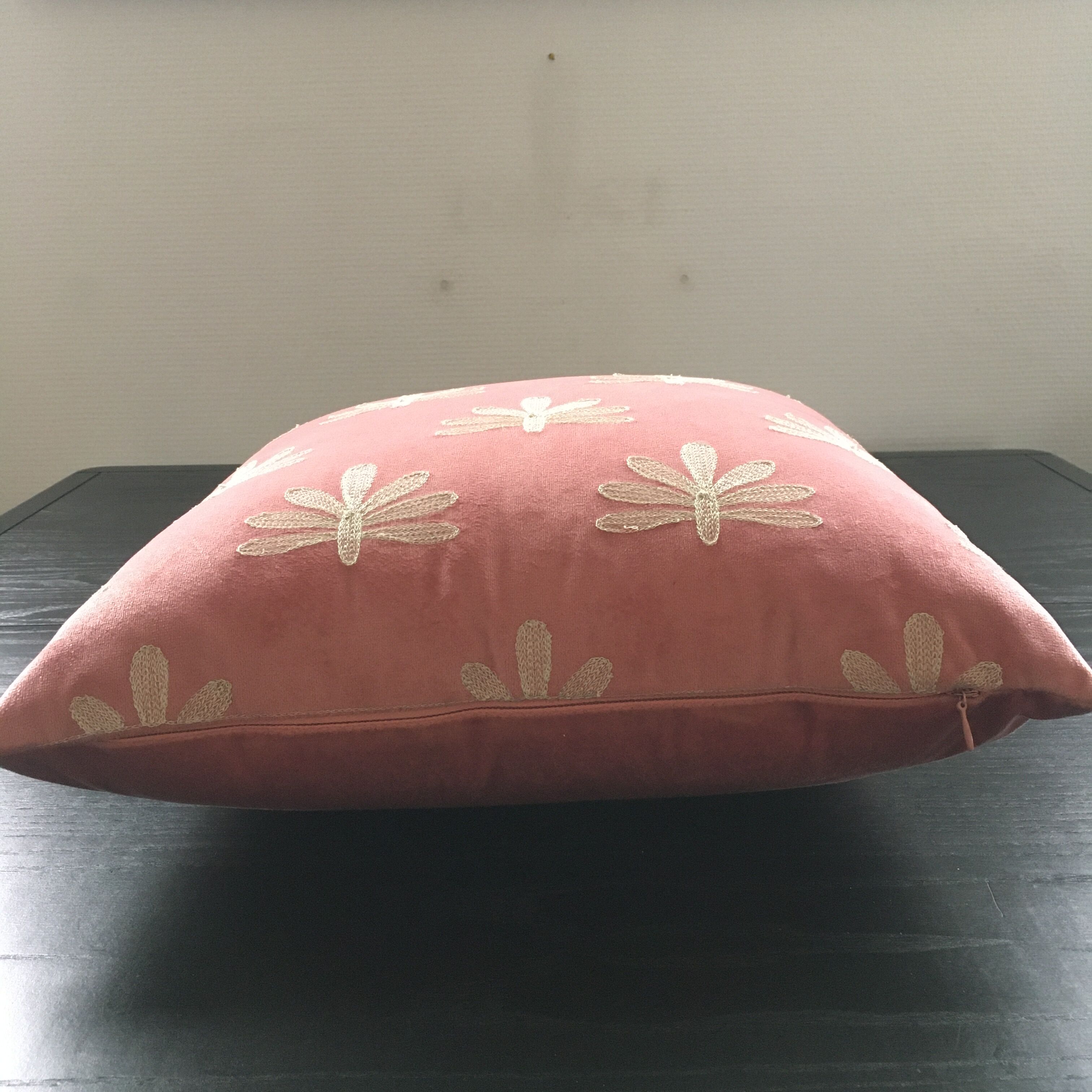 Pink cushion embroidered palm trees