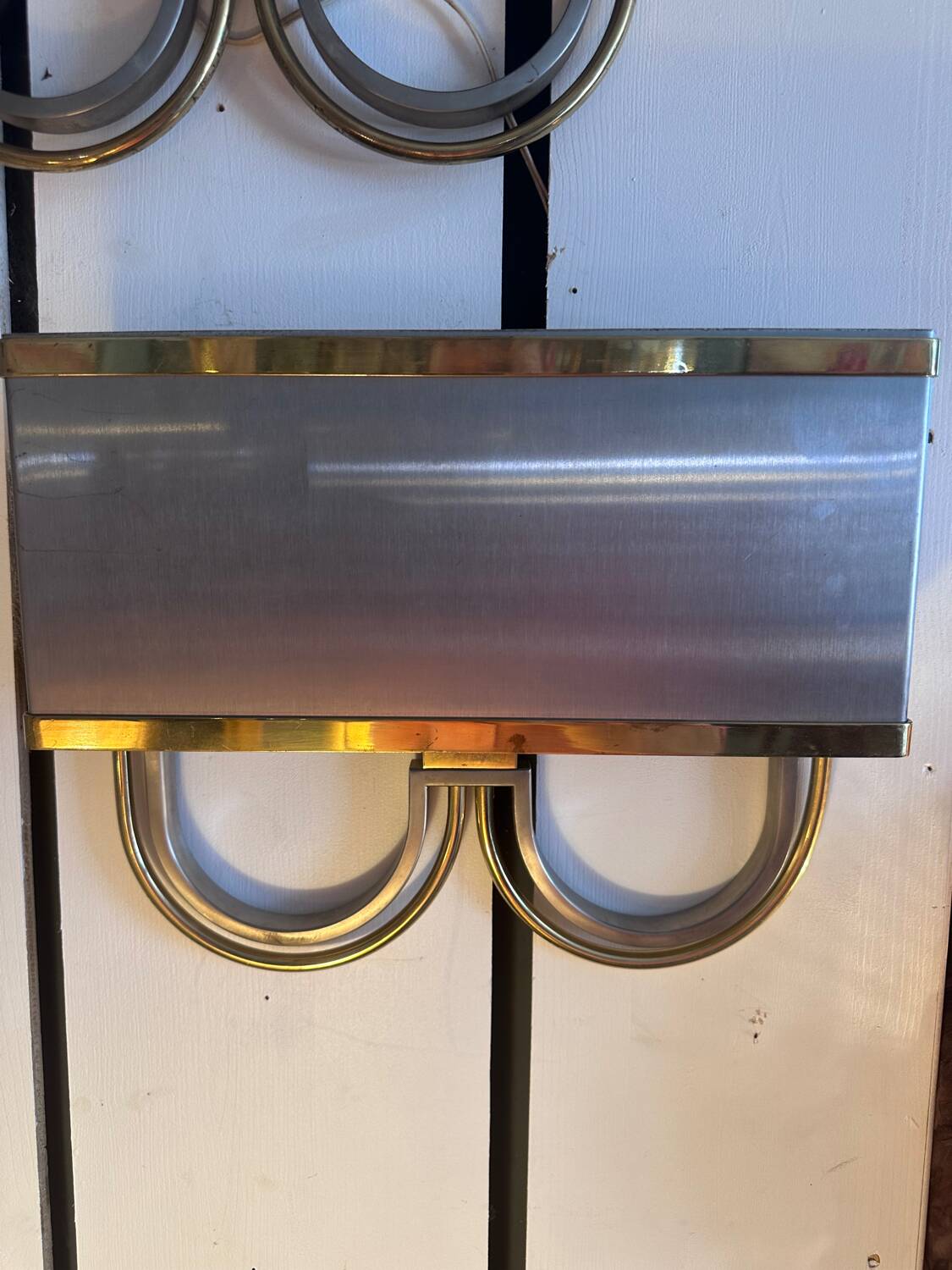 Pair of stainless steel and brass wall lights