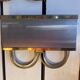Pair of stainless steel and brass wall lights