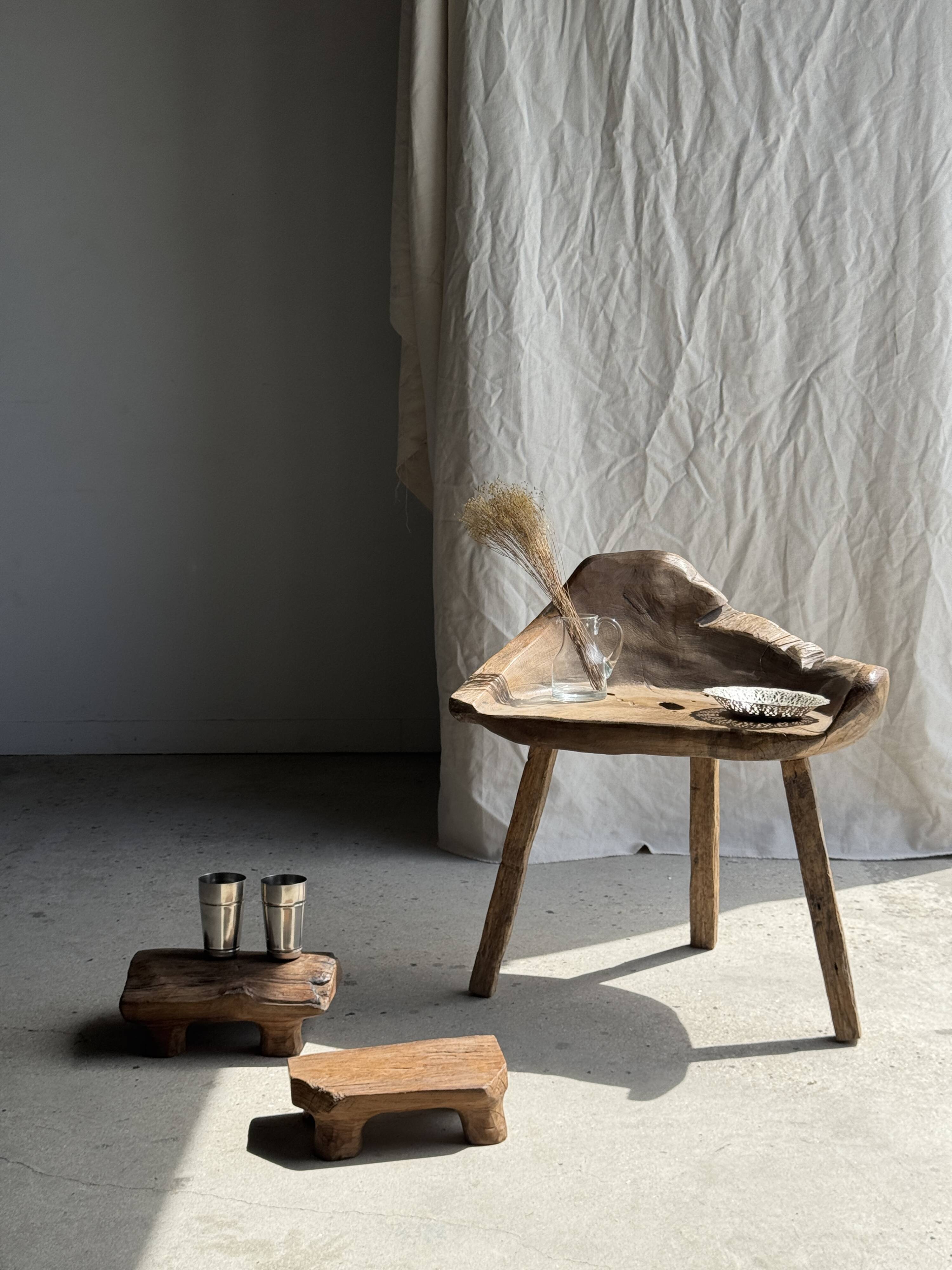 Small stool, teak footrest with short cut corners.