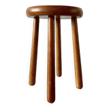 Old solid wood stool with four legs