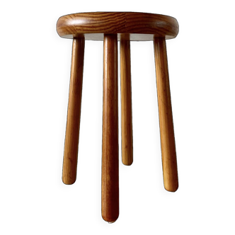 Old solid wood stool with four legs