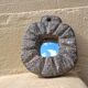 Brutalist mirror in hand-carved natural stone