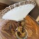 Antique wall light in lace opaline and brass.