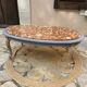 Oval coffee table in marble and wood