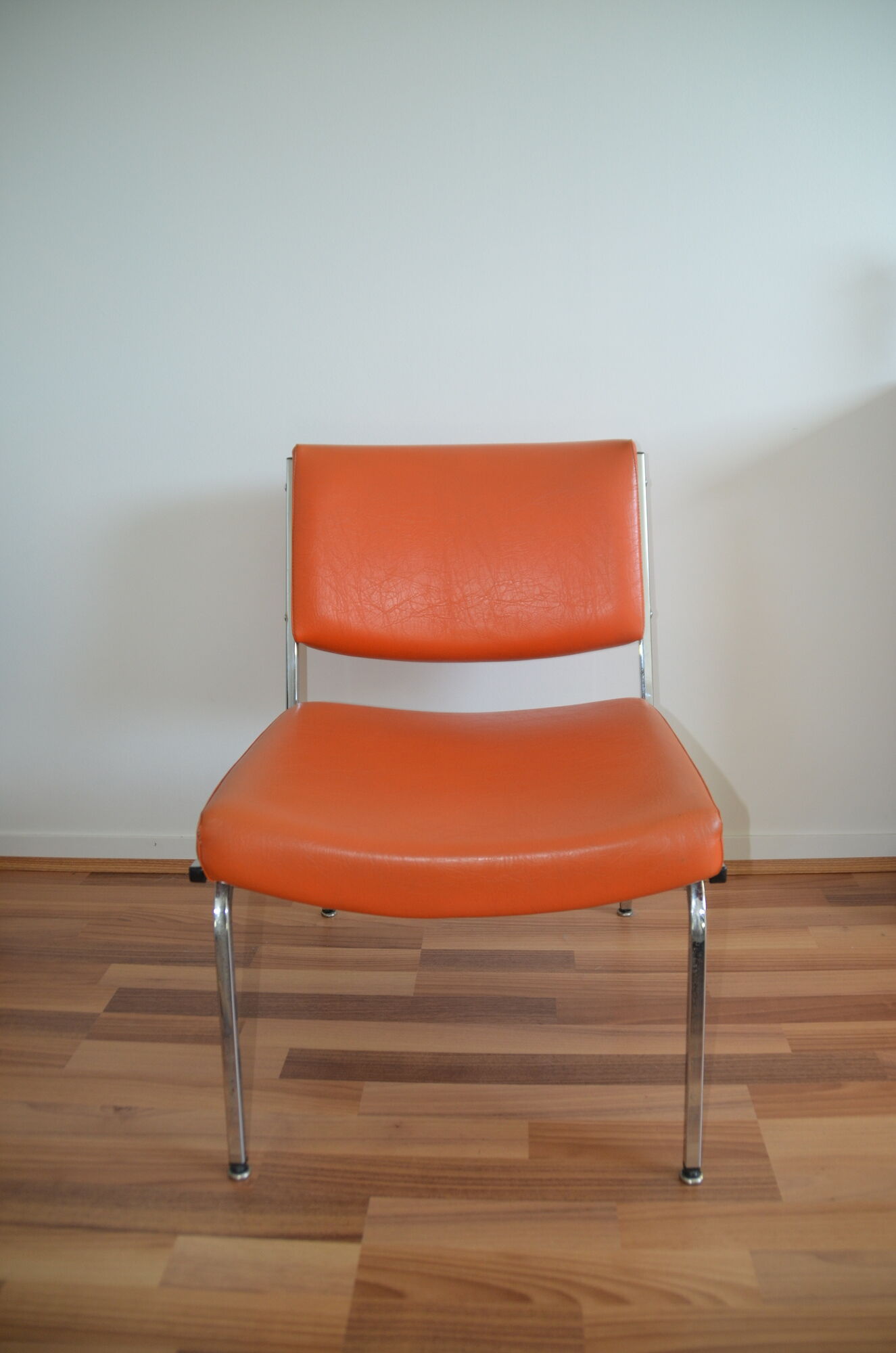 Armchair modernist vintage in orange leatherette 60 years
