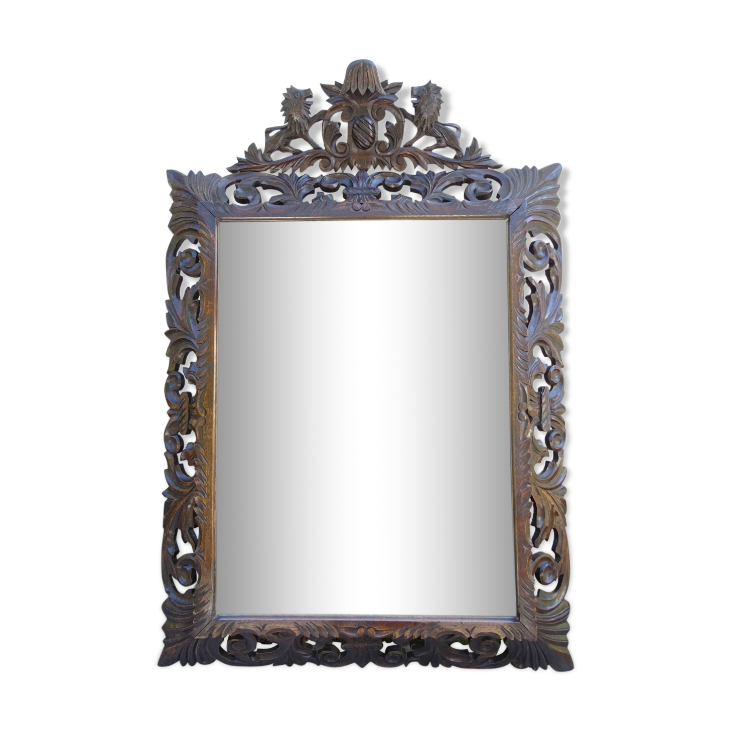 Miroir sculpté fronton lions