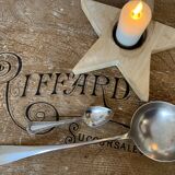 1 ladle and 1 spoon in silver