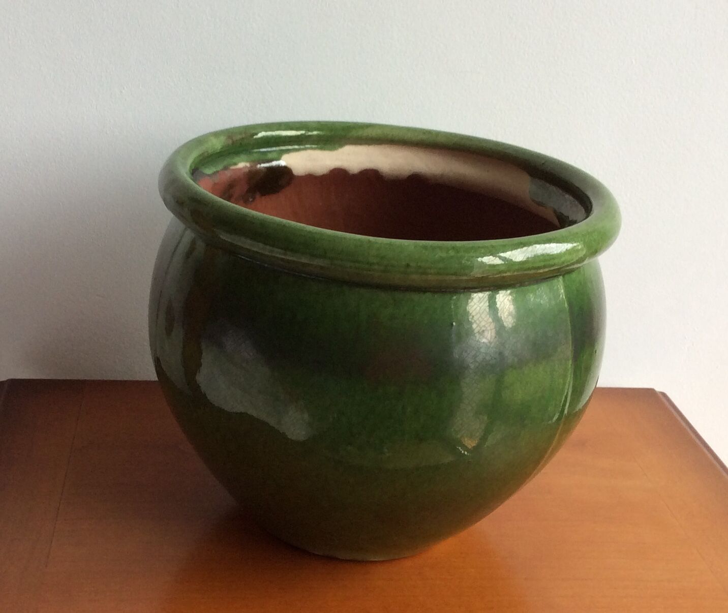 Old terracotta pot enamelled ball shape