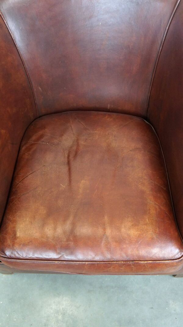 Fauteuil club confortable et spacieux en cuir de mouton avec coussin de siège amovible