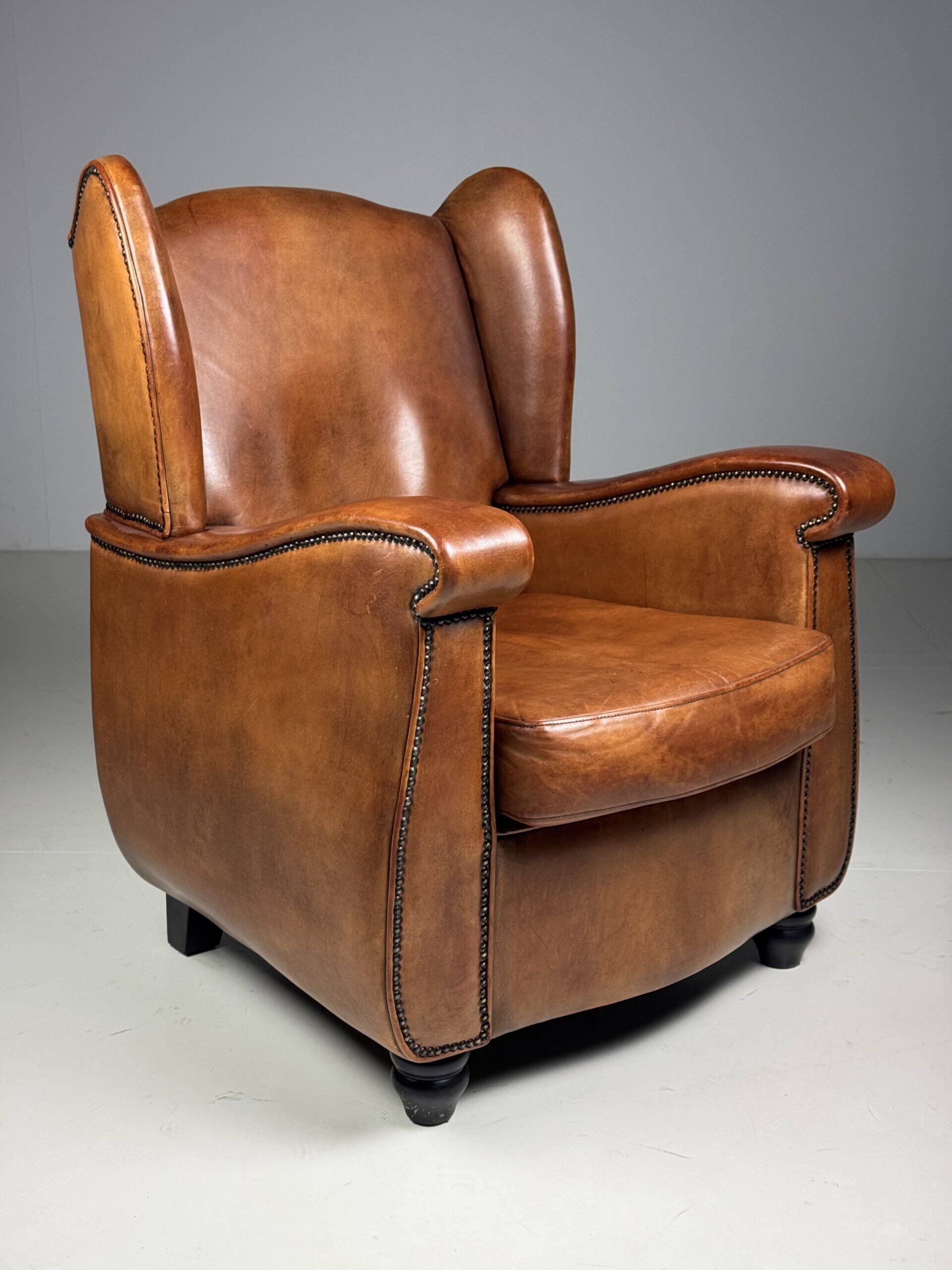 Set of 2 sheepskin club armchairs