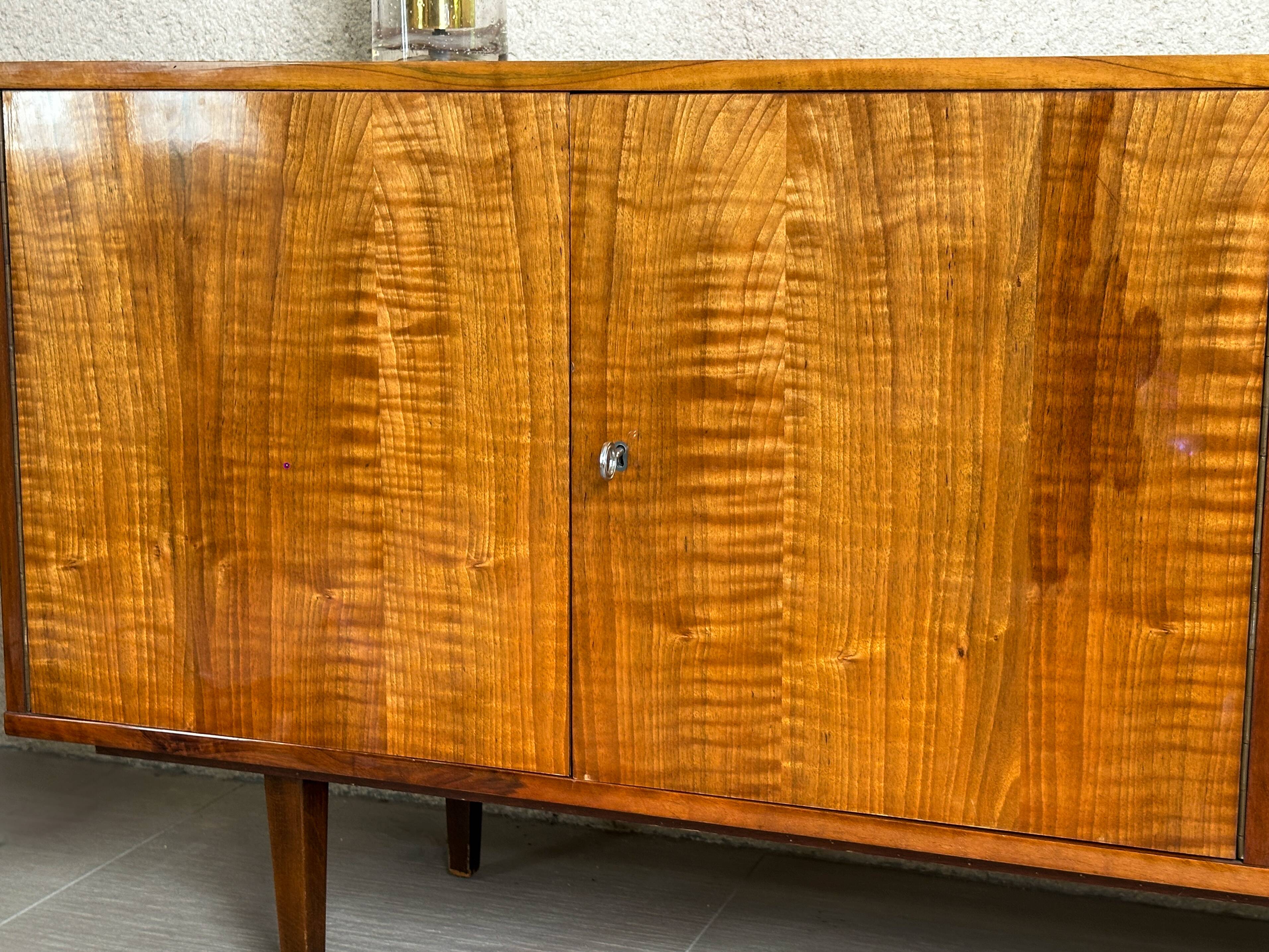 Violetta sideboard in walnut and mahogany, Piotrkowskie Fabryki Mebli, Poland, 1960.