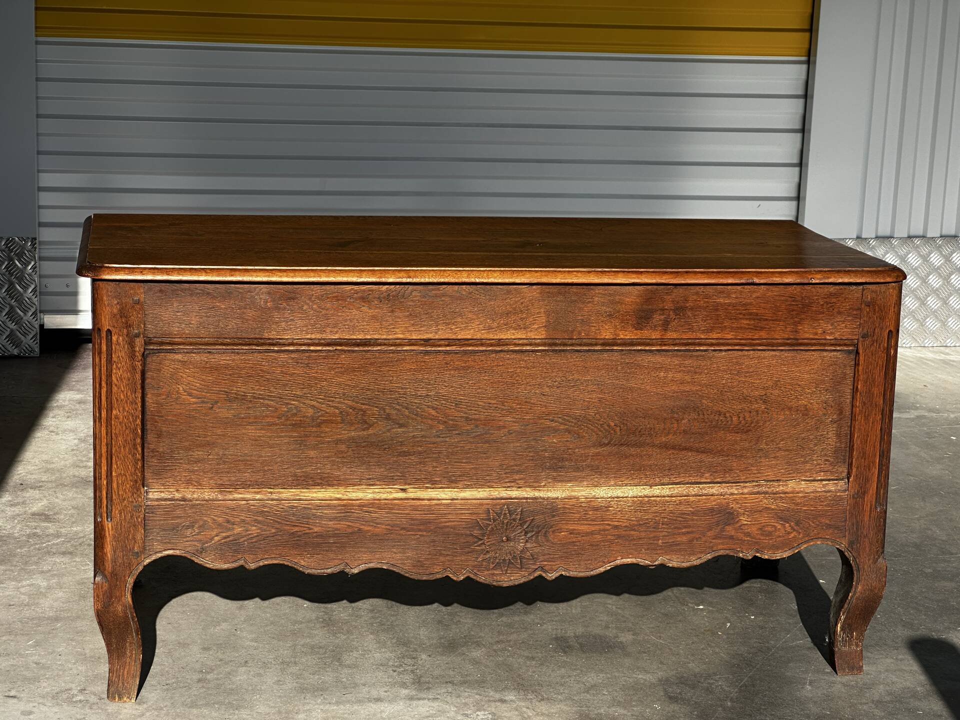 French provincial chest in carved and pegged solid oak, 18th century.