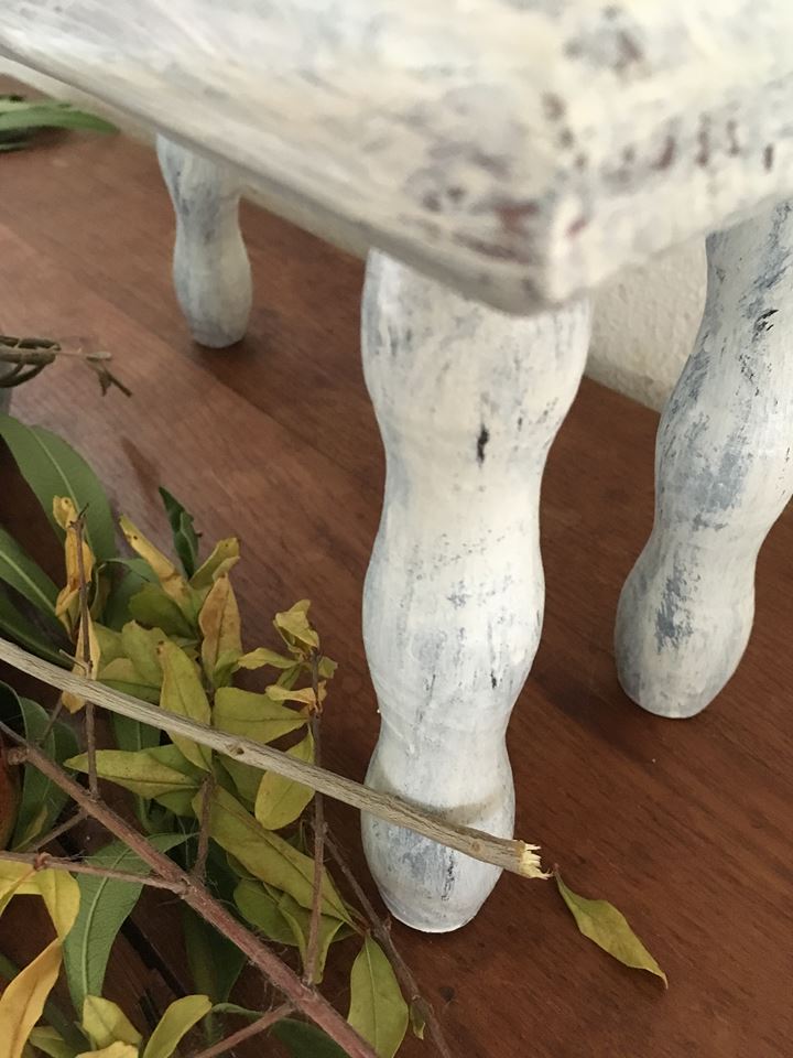 Wooden footrest in his white patina