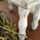 Wooden footrest in his white patina
