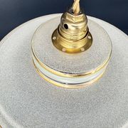 Set of 4 Art Deco pendant lights in frosted water green and gold.