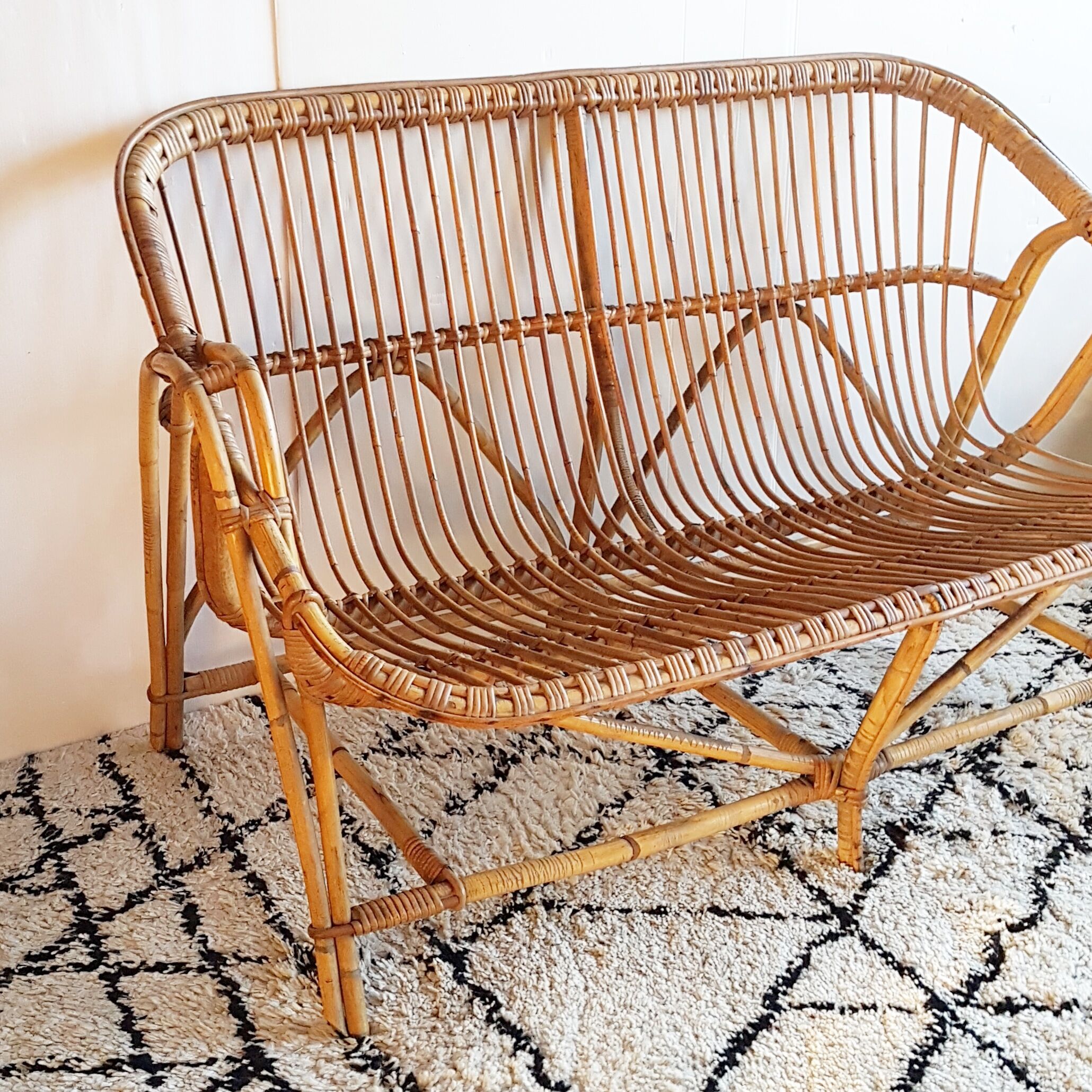 Bench into rattan of the 1960s