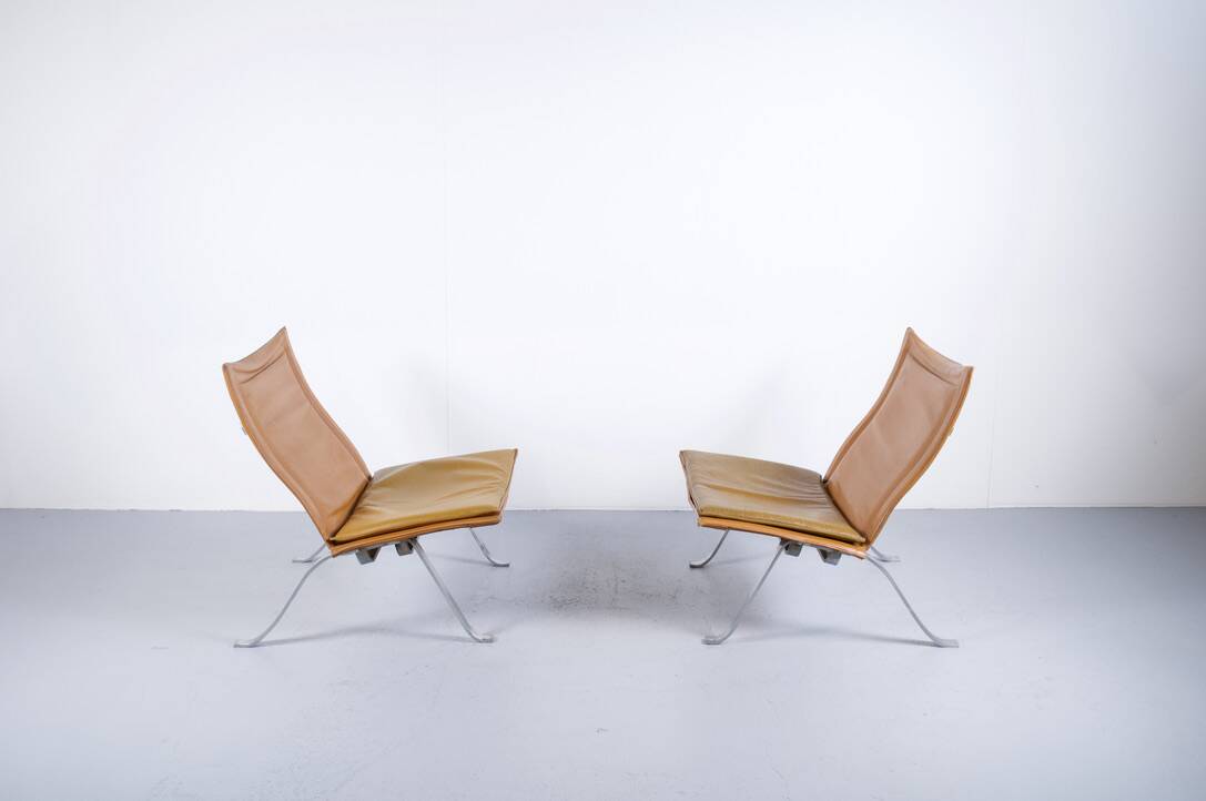 Imposing pair of leather and steel armchairs from the 1960s