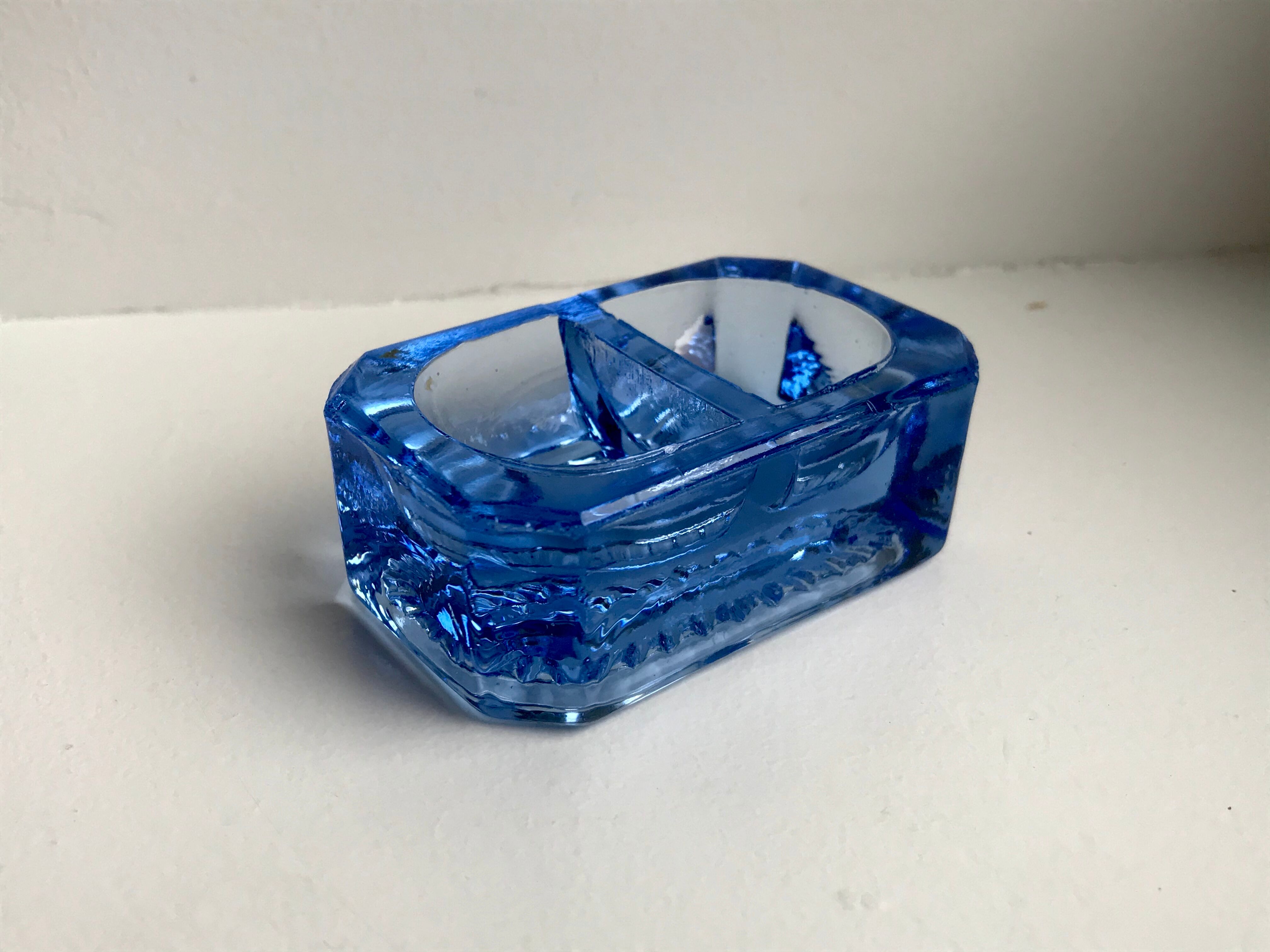 Salt shaker in electric blue molded glass