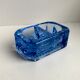 Salt shaker in electric blue molded glass