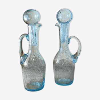 Pair of blue bubbled blown glass decanters