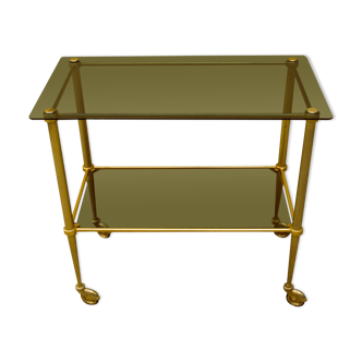 Antique brass serving trolley with smoked glass top, Louis XVI style.