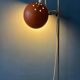 Mid-Century orange floor lamp with "eyeball" shade
