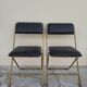 Pair of vintage 1950s Lafuma black folding chairs