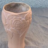Terracotta vase with a vintage ceramic relief rose pattern