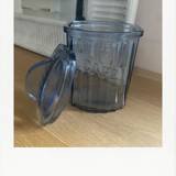 Old coffee pot in blue glass