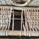 Vintage foldable beach chair, picnic in rattan and leather.