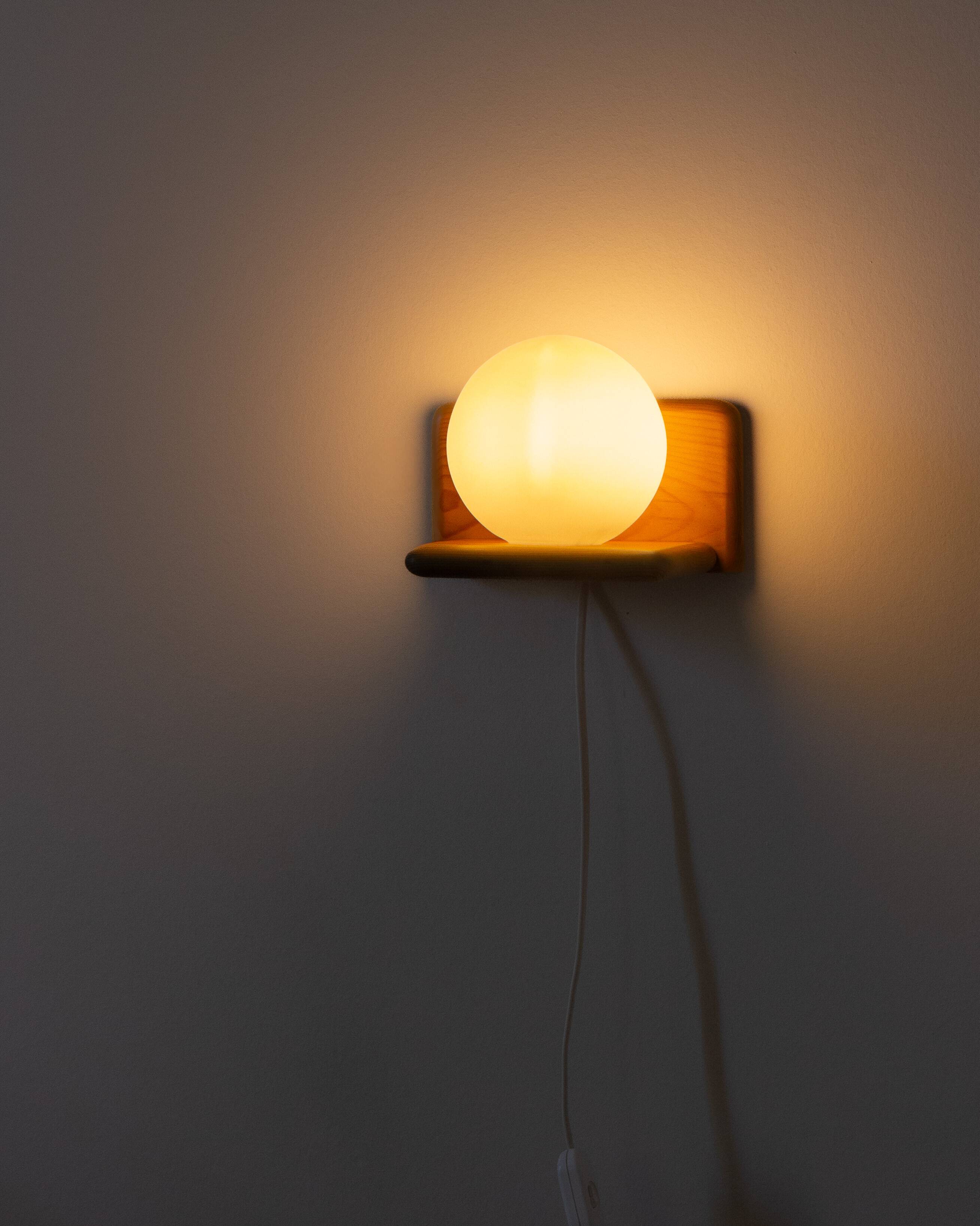 Duo of pine and opaline glass wall lights, 1980s