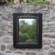 Vintage black and gold wooden mirror with a pediment – Napoléon III style
