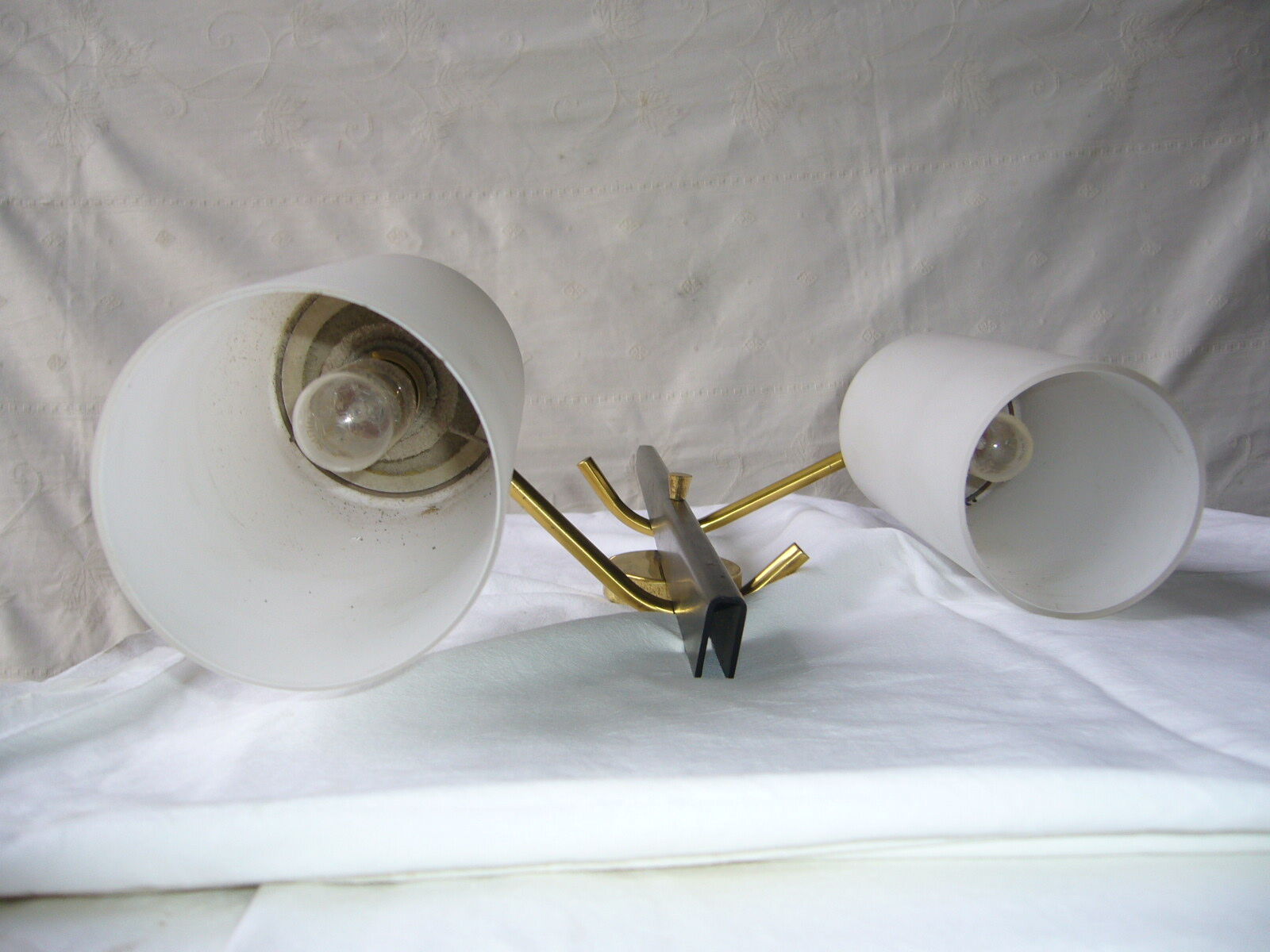 Black and gold metal sconces, Arlus house opalin lenses from the 1950s